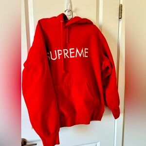 Supreme's Capital Hooded Sweatshirt is named for the logo in all-caps lettering.